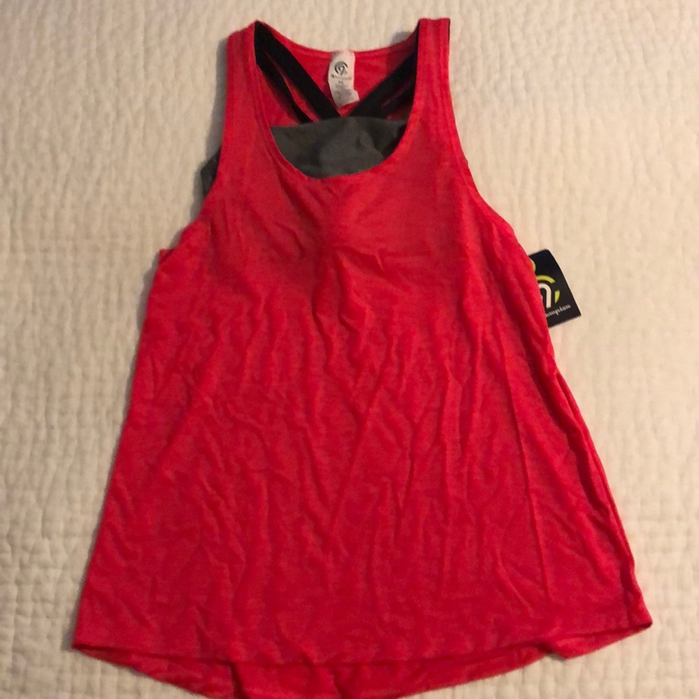 Brand new! Work out top with attached sports bra